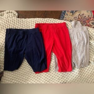 3 pairs of Carter’s leggings size 12: navy blue, red, and gray